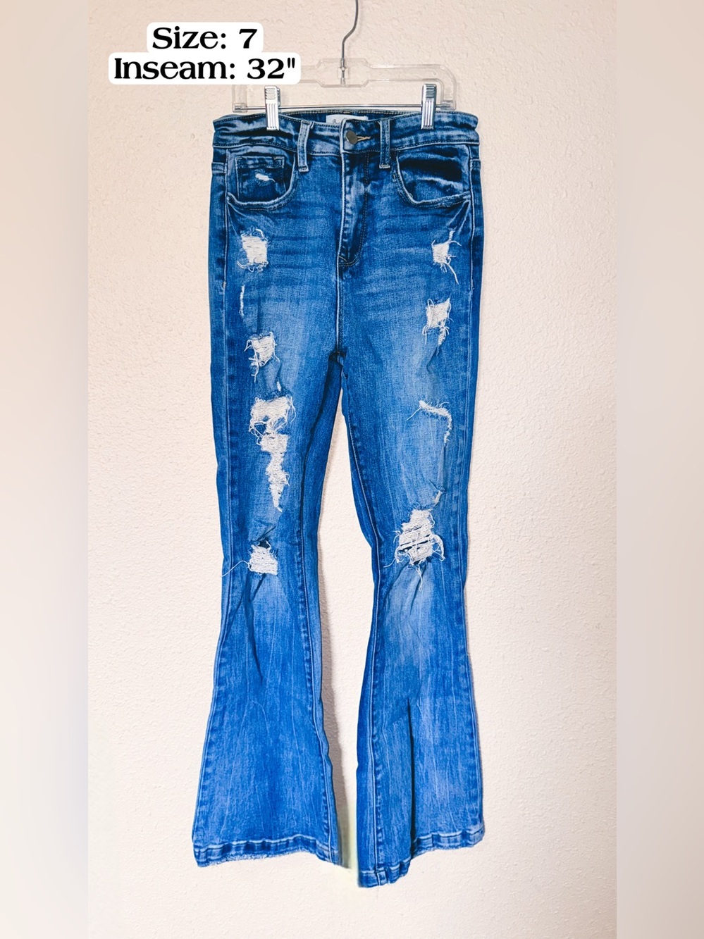 Bailey Made High-Rise Distressed Flare Jeans in Medium Blue